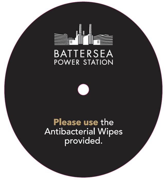 Custom printed dispenser with Battersea Power Station logo for antibacterial wipes.