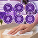 Liquidate® Sunbed & Salon biodegradable wipes, white textured sheets with purple antibacterial and lemon-scented feature icons.