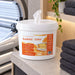 Liquidate® Sunbed & Salon antibacterial wipes in a white refillable bucket, with orange label and tissue dispensing from the lid.