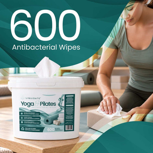Liquidate® Yoga & Pilates antibacterial wipes in a white 600-sheet bucket, with teal product label and pop-up wipe.